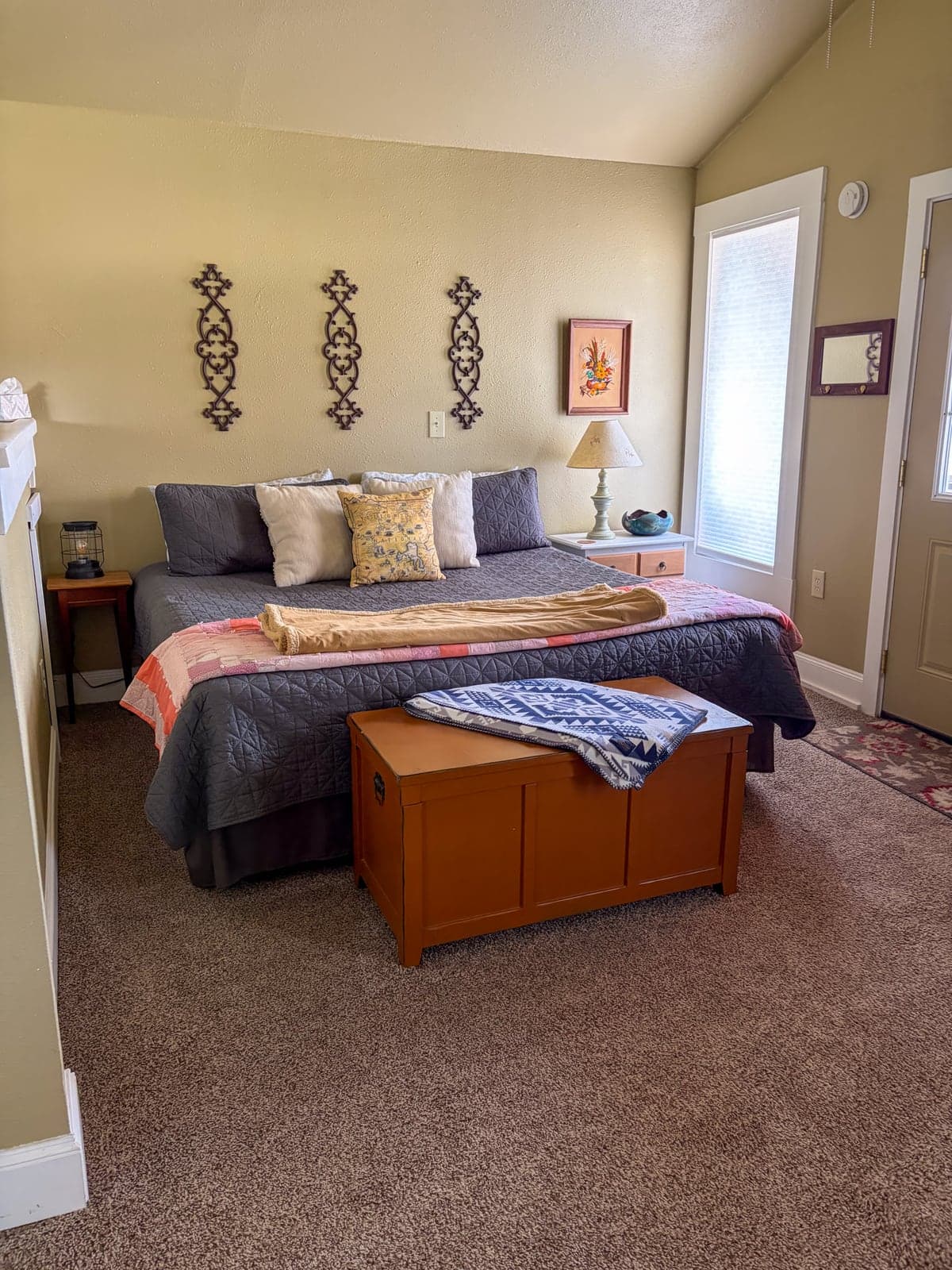 King bed and sleeping area inside The Cottage